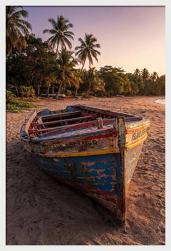 Old Fishing Boat Beached At Sunset