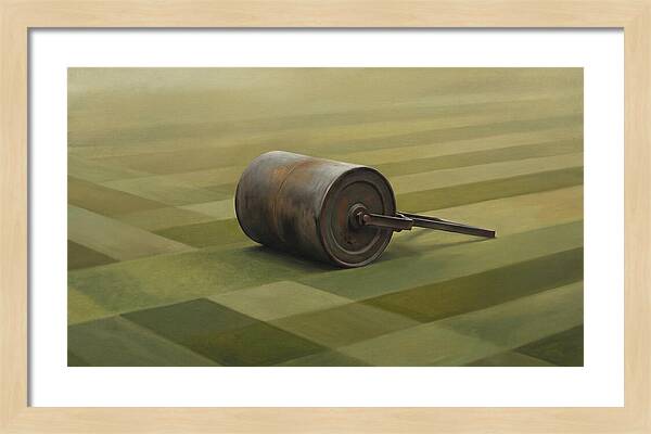 Old Garden Roller On Manicured Lawn