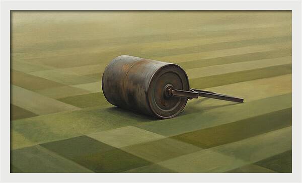 Old Garden Roller On Manicured Lawn