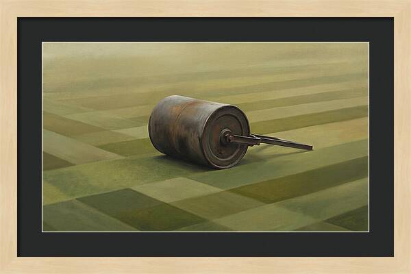 Old Garden Roller On Manicured Lawn