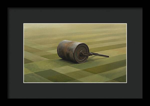 Old Garden Roller On Manicured Lawn