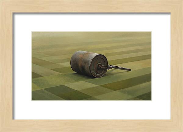 Old Garden Roller On Manicured Lawn