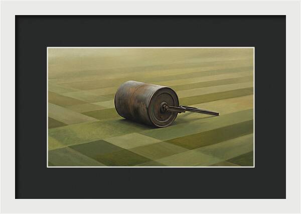 Old Garden Roller On Manicured Lawn