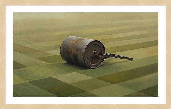 Old Garden Roller On Manicured Lawn