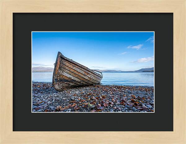 Old Rowing Boat On Lake Shore
