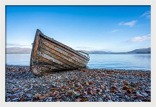 Old Rowing Boat On Lake Shore