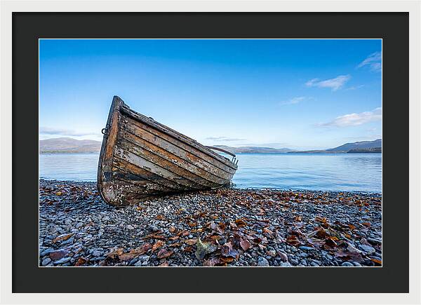 Old Rowing Boat On Lake Shore