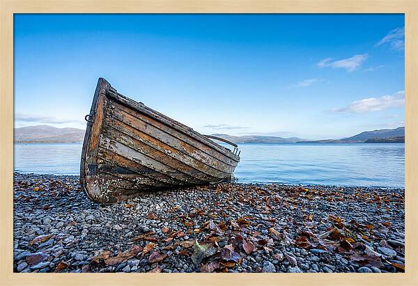 Old Rowing Boat On Lake Shore