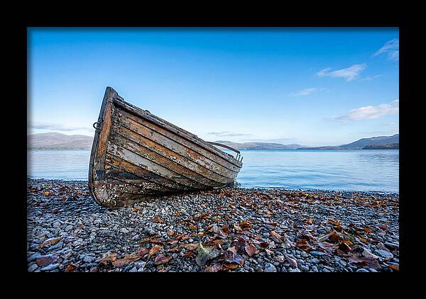 Old Rowing Boat On Lake Shore