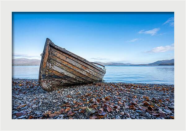 Old Rowing Boat On Lake Shore