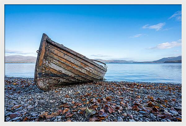 Old Rowing Boat On Lake Shore