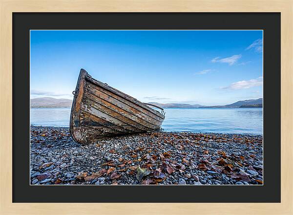 Old Rowing Boat On Lake Shore