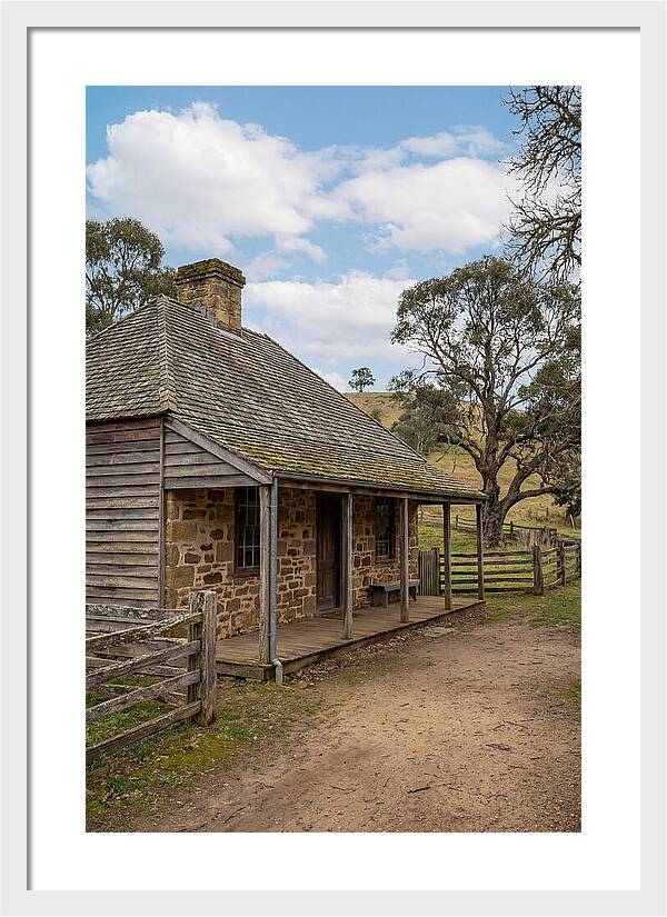 Old Stone Homestead Under Blue Skies