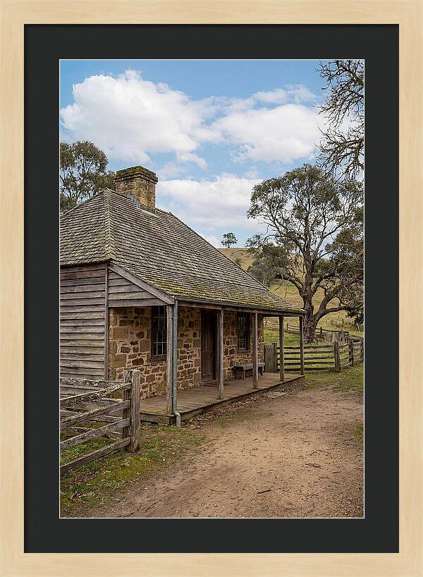 Old Stone Homestead Under Blue Skies