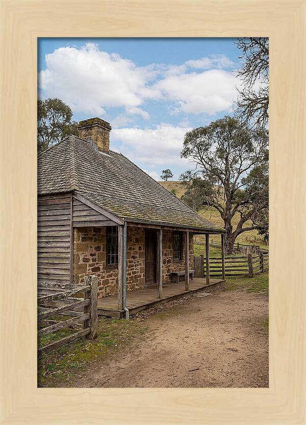 Old Stone Homestead Under Blue Skies