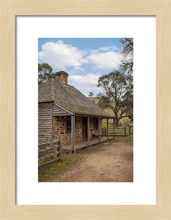 Old Stone Homestead Under Blue Skies