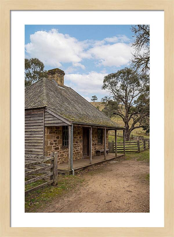 Old Stone Homestead Under Blue Skies