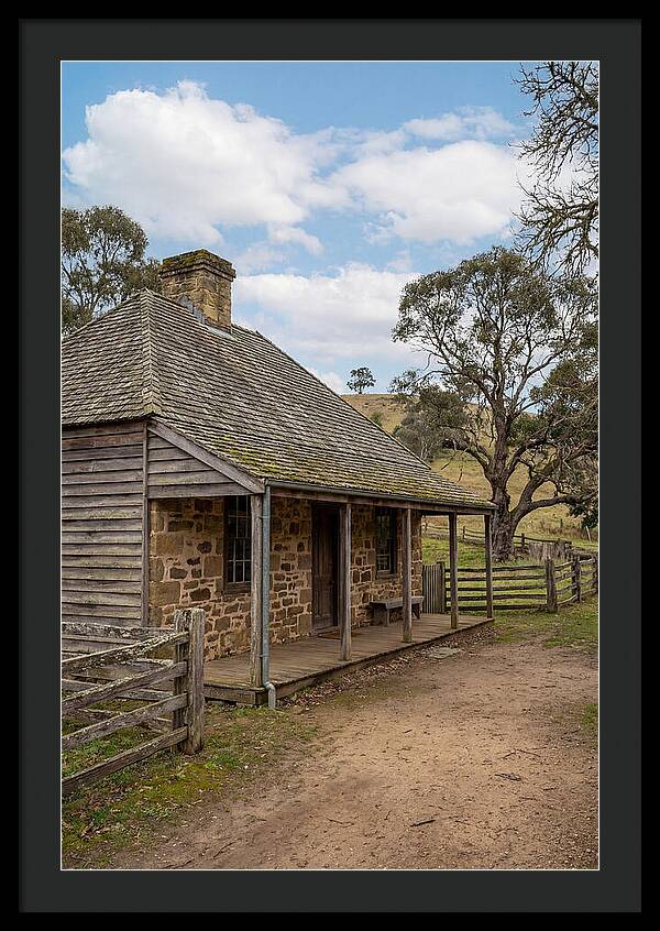 Old Stone Homestead Under Blue Skies