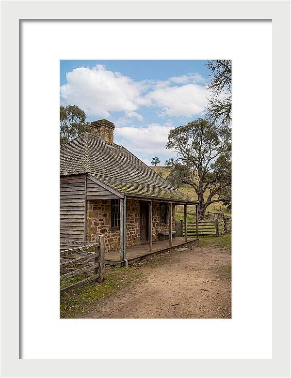 Old Stone Homestead Under Blue Skies