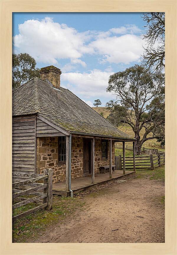 Old Stone Homestead Under Blue Skies