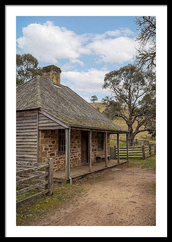 Old Stone Homestead Under Blue Skies