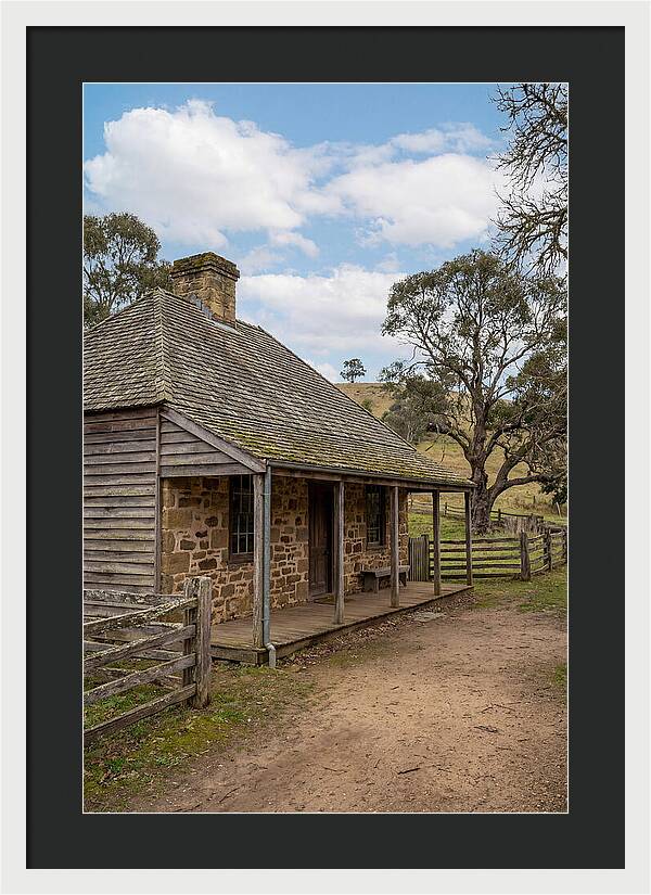 Old Stone Homestead Under Blue Skies