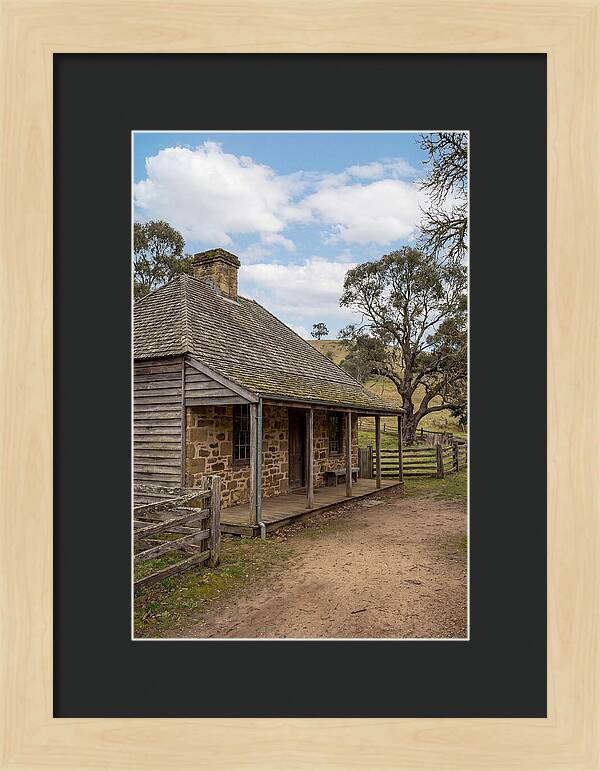 Old Stone Homestead Under Blue Skies