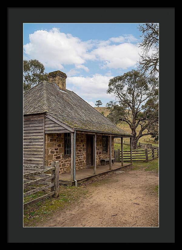 Old Stone Homestead Under Blue Skies