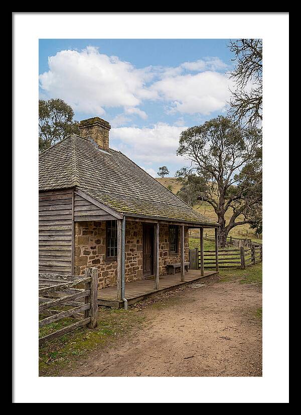 Old Stone Homestead Under Blue Skies