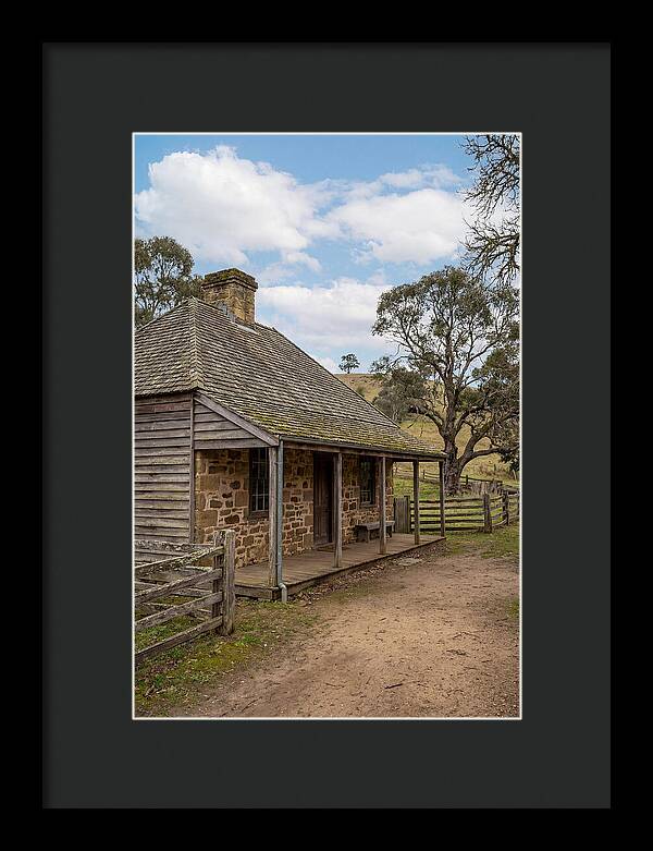 Old Stone Homestead Under Blue Skies