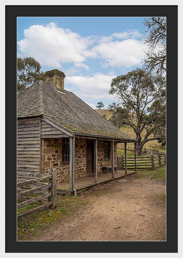 Old Stone Homestead Under Blue Skies