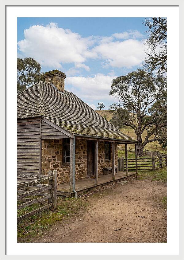 Old Stone Homestead Under Blue Skies