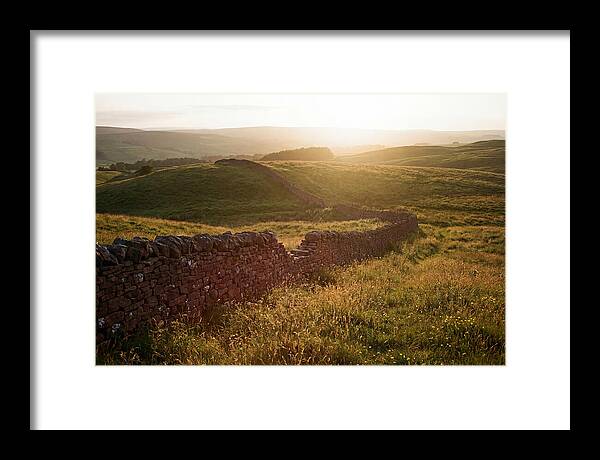 Old Stone Wall Through Green Hills