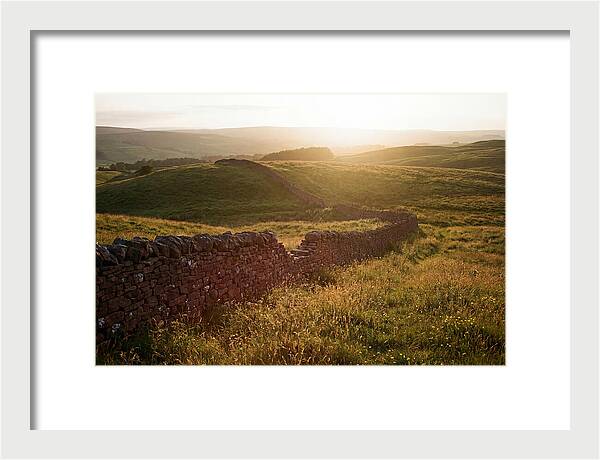 Old Stone Wall Through Green Hills