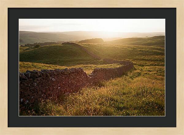 Old Stone Wall Through Green Hills