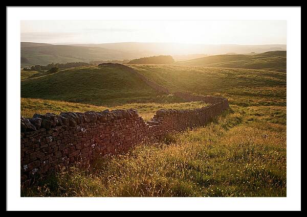 Old Stone Wall Through Green Hills