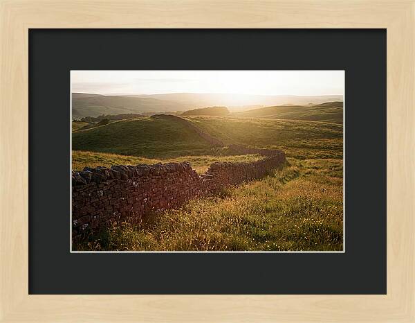 Old Stone Wall Through Green Hills