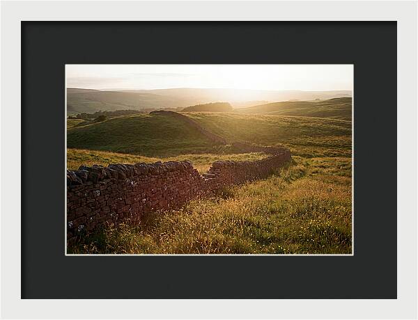 Old Stone Wall Through Green Hills