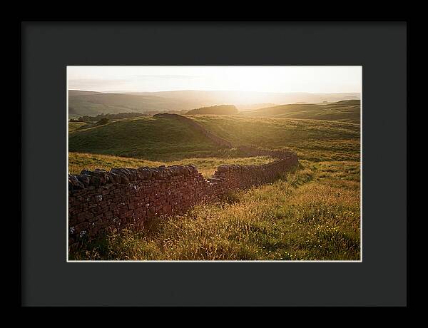 Old Stone Wall Through Green Hills