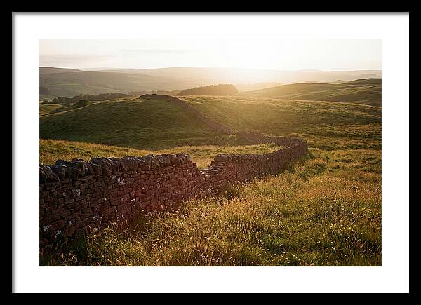 Old Stone Wall Through Green Hills