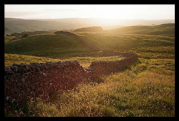 Old Stone Wall Through Green Hills