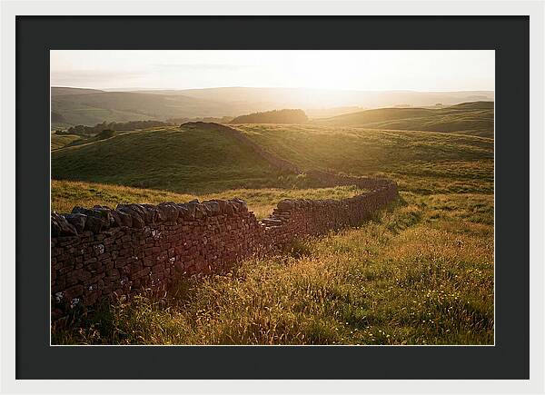 Old Stone Wall Through Green Hills