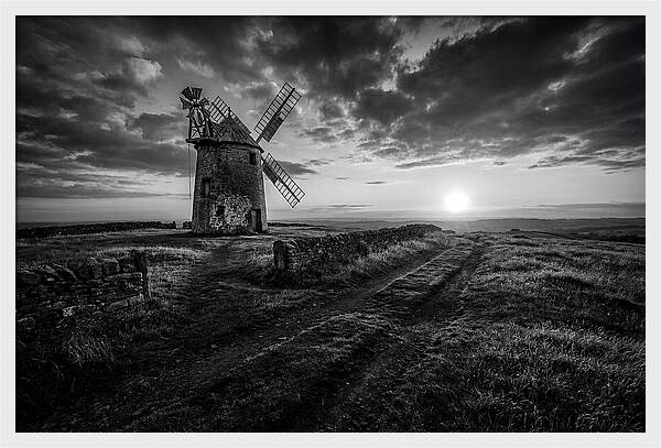Old Stone Windmill At Sunset