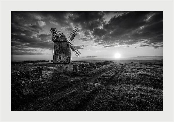 Old Stone Windmill At Sunset