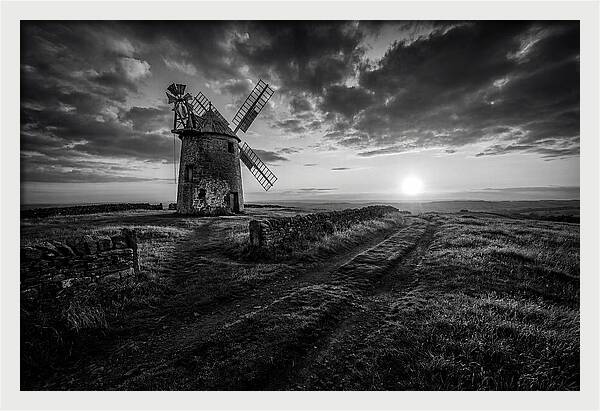 Old Stone Windmill At Sunset
