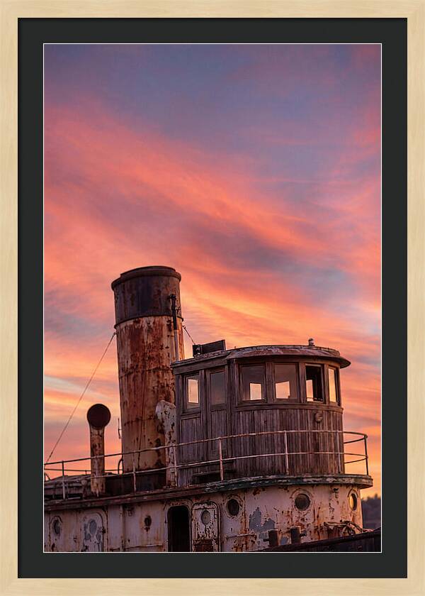 Old Tugboat Under Sunset