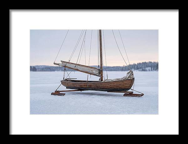 Old Wooden Ice Boat On Frozen Lake