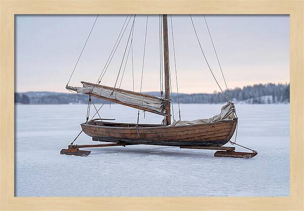 Old Wooden Ice Boat On Frozen Lake