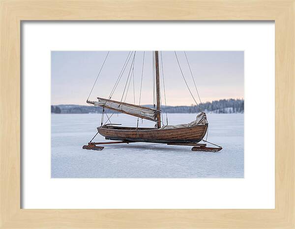 Old Wooden Ice Boat On Frozen Lake