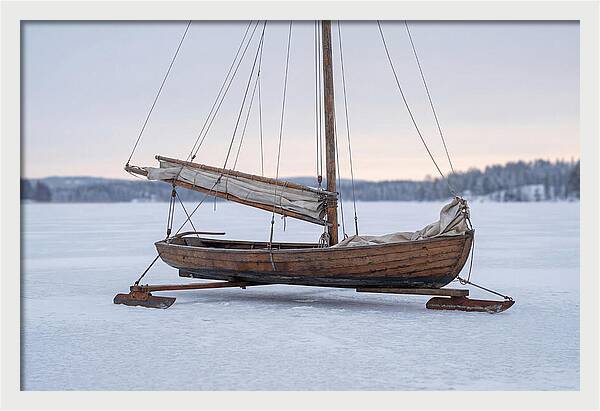 Old Wooden Ice Boat On Frozen Lake